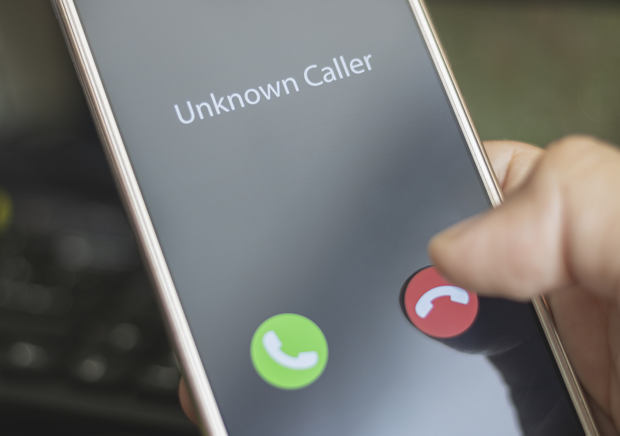Unknown Caller appearing on a mobile phone screen