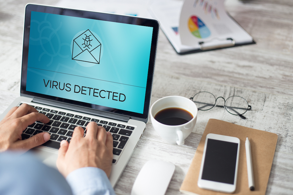 Laptop screen displaying Virus Detected