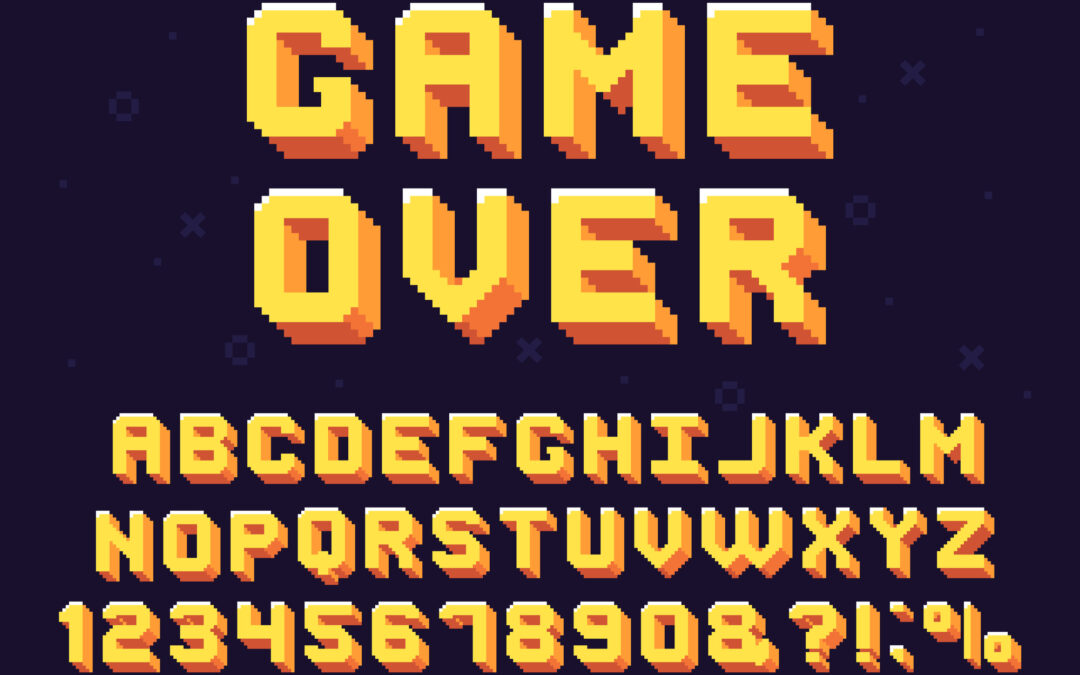 Video game screen reads: Game Over ABCDEFGHIJKLMNOPQRSTUVWXYZ12345678908,?!:%